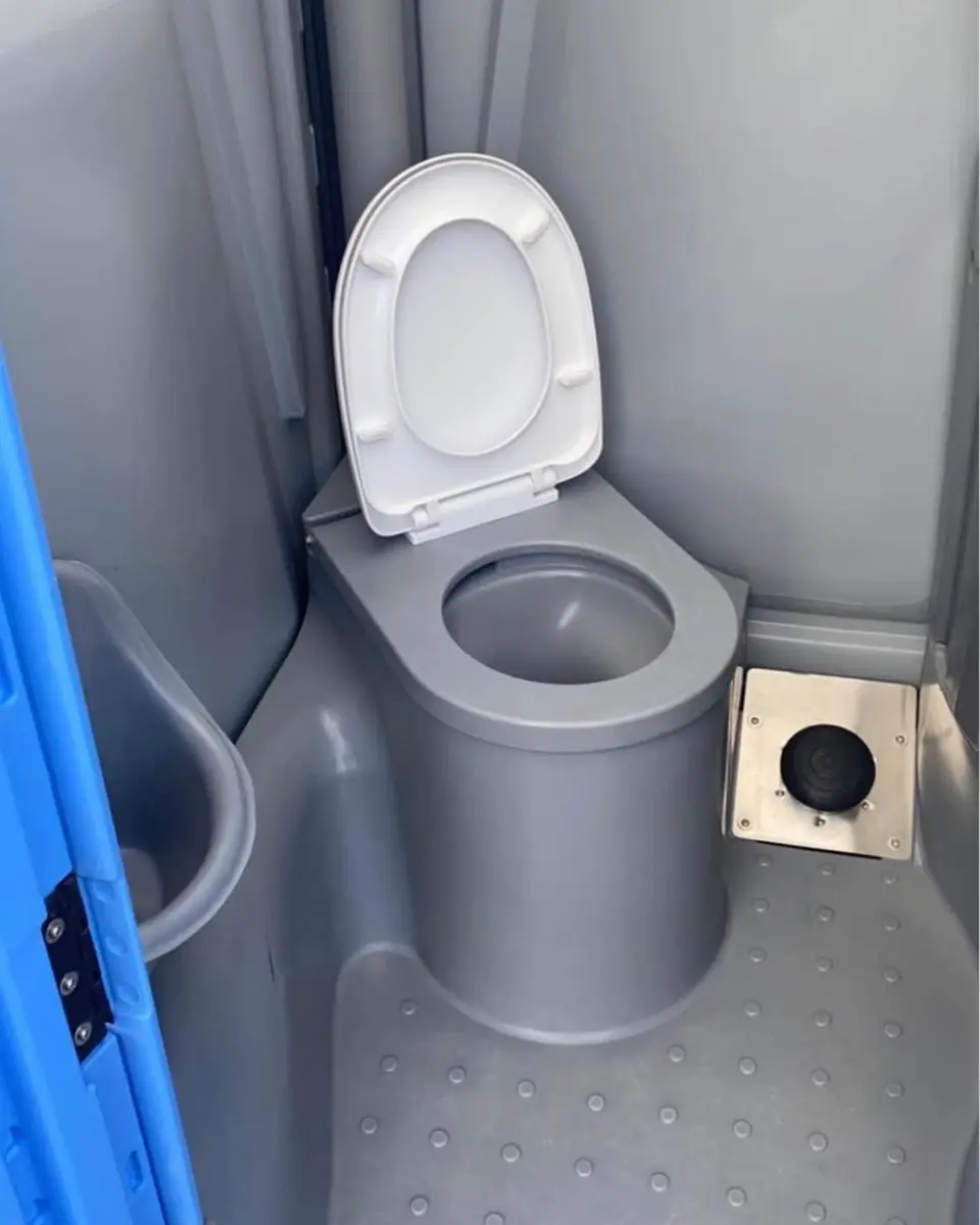 Clean porta potty seat and floor after a service visit