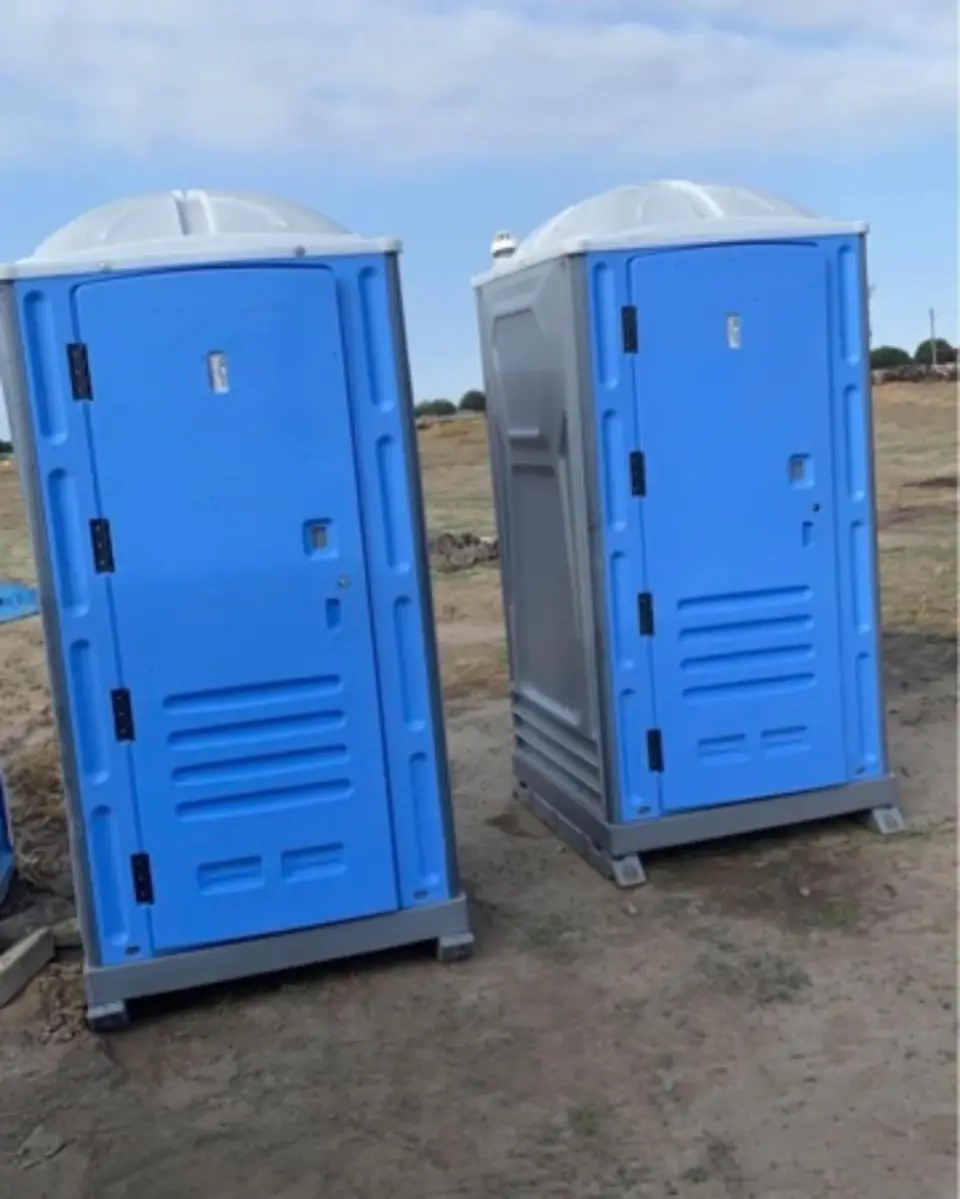 Two standard blue porta potties ready for delivery in St. Charles, MO